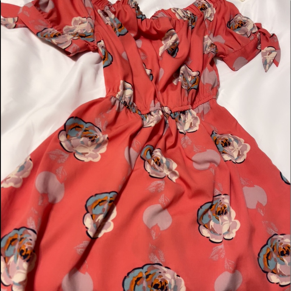 Mine floral summer dress. Good for shorts and good for beach. Very soft.